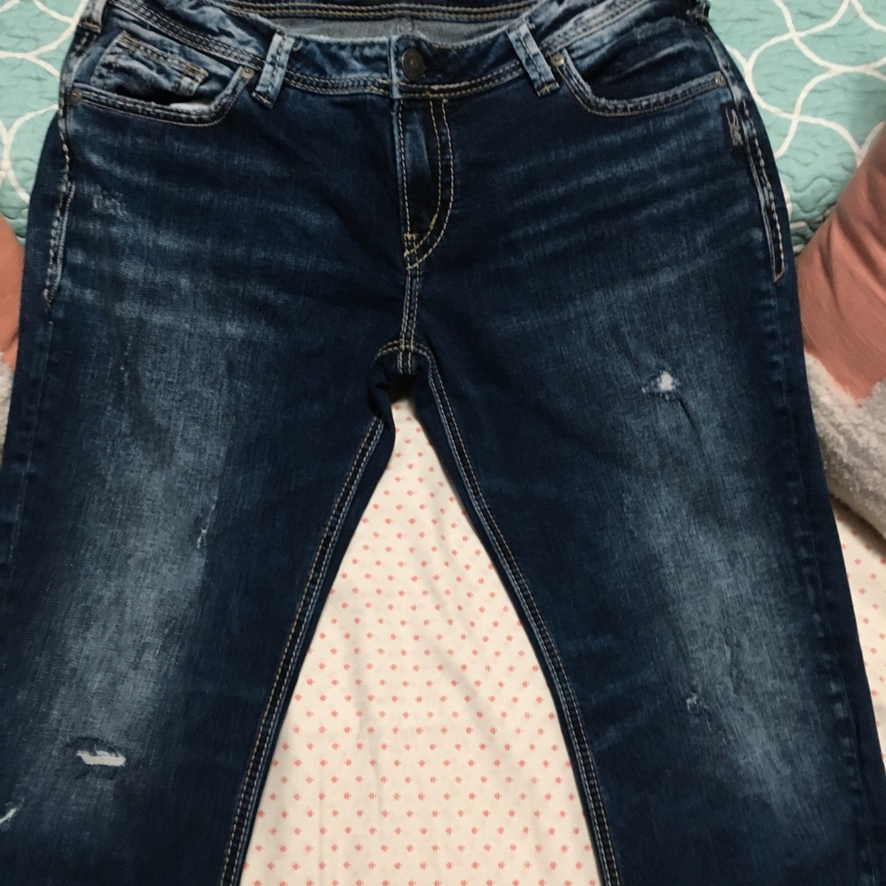 Silver “Sam” jeans 27L